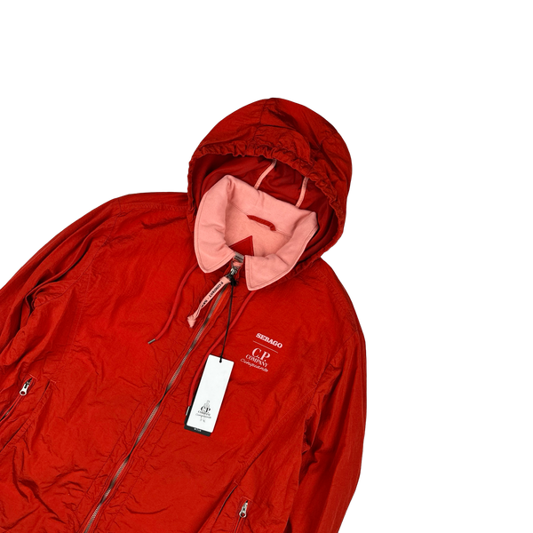 cp company sebago ナイロンブルゾン CP Company X Sebago Red Nylon Cotton Lined Collared Jacket - Large